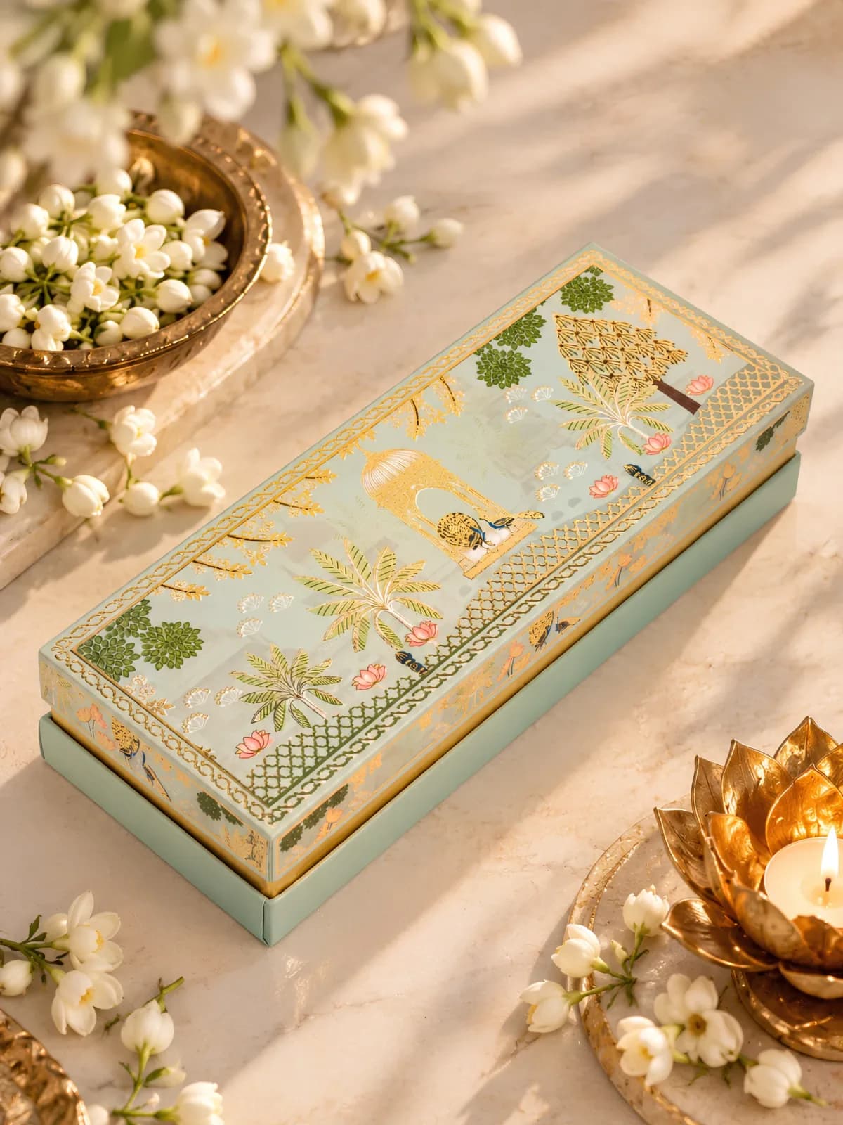 Candy Couture Diwali Box of 4 in a long mint and gold illustrated gift box